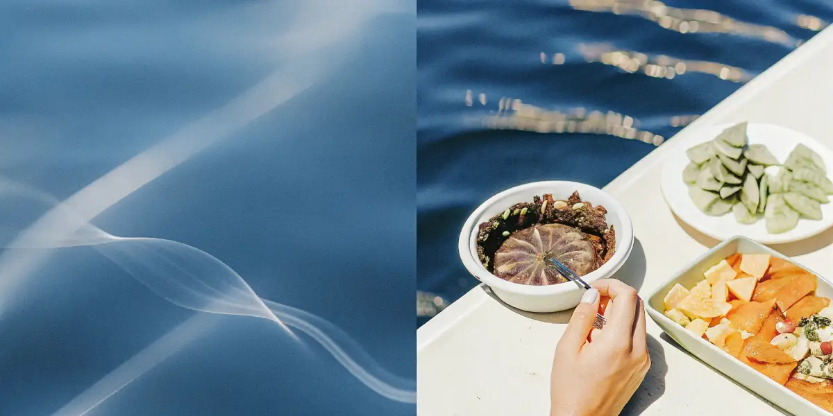 Split image: Abstract blue background with white lines; A hand reaching for food on a boat, with snacks like sliced cucumbers and fruit, by blue water.