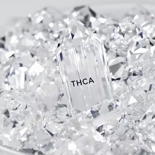 THCA diamonds displayed in a glass container with THCA label